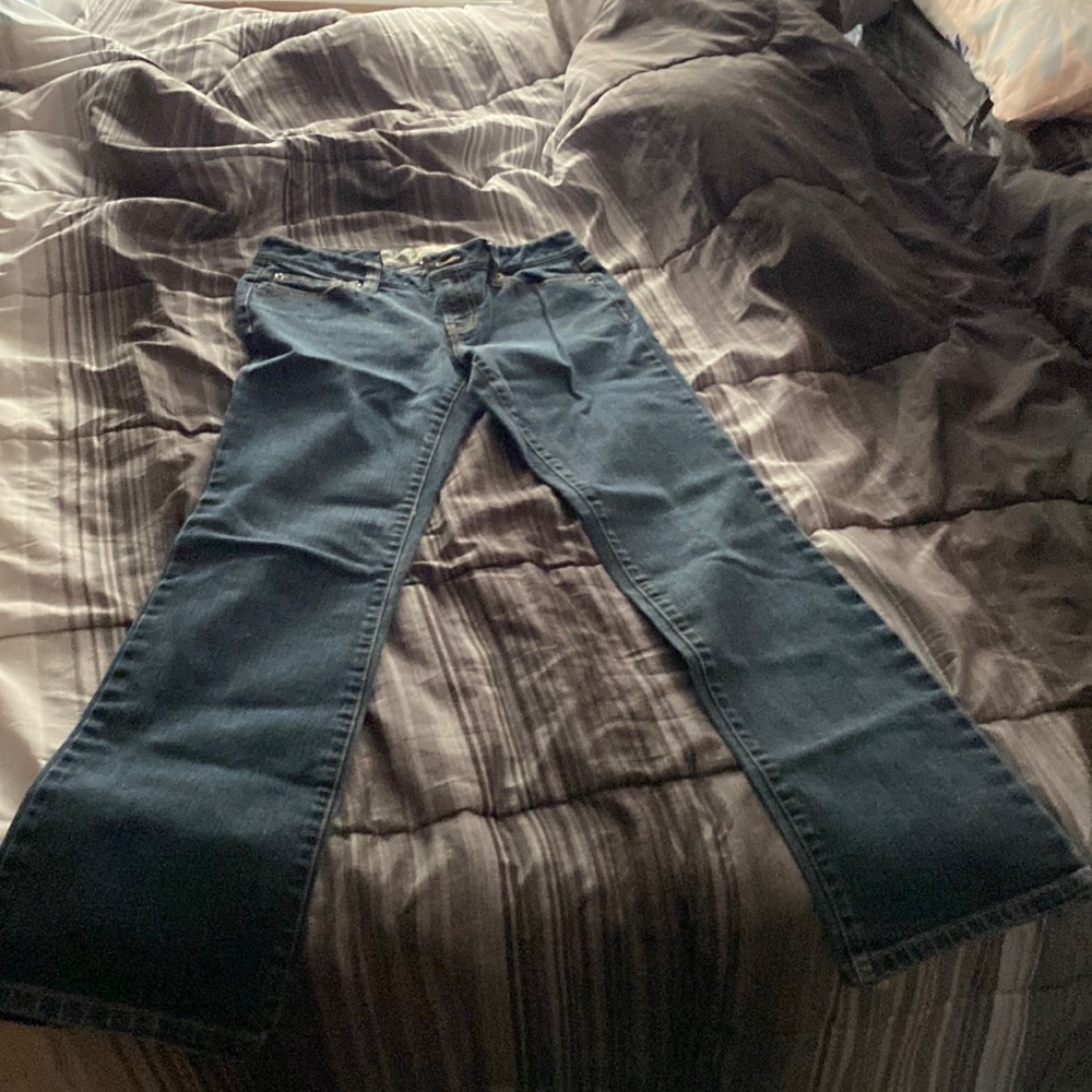 Women jeans size 2P good shape some wear& tear on back of bottom seam